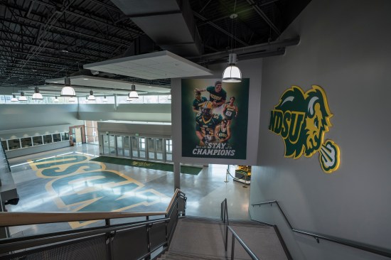 Bold, targeted graphics and messaging visually engage guests as they exit the space