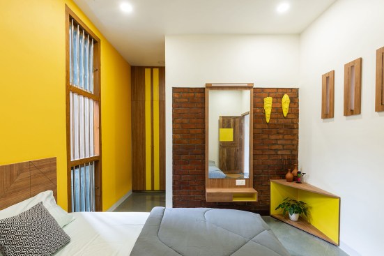 Bedroom 02 is dominated by yellow