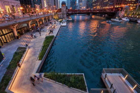 At The Cove, tree branch patterns are projected onto the walkway from pole-mounted, weatherproof theatrical fixtures located above at street level.