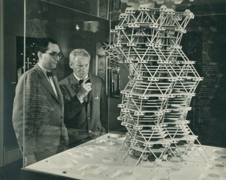 Kahn discusses a model of his unbuilt City Tower Project, on display in a Cornell University exhibition in 1958