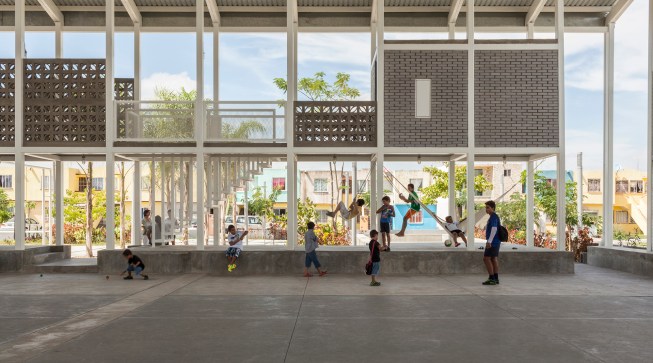 Montiel uses latticework and palm wood to evoke the nearby seaside for this community center in Veracruz, Mexico. The space features a multisport court, recreational areas, and balconies.