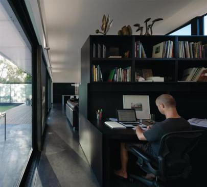 The live/work pavilion houses the owners three-person architecture studio.