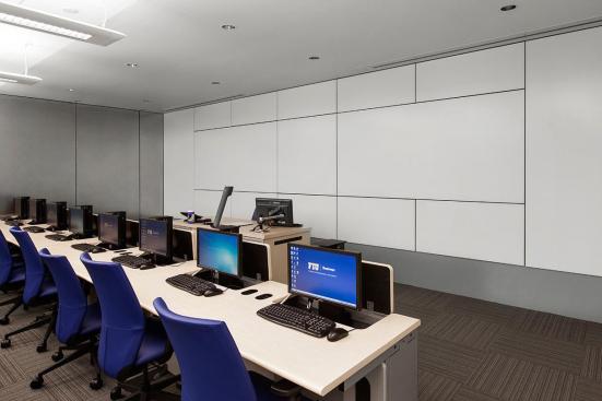 LEVELe Wall System with Blind panels; insets in ViviChrome Scribe glass with White interlayer and Pearlex finish; Stainless Steel with Linen finish at Florida International University - Ryder School of Business, Media Labs, Miami, Florida