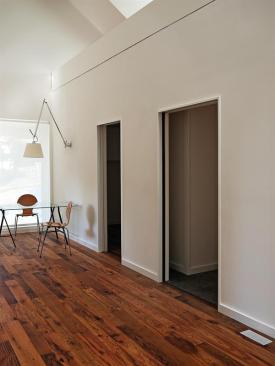 The home's private zones have lower ceilings to allow for the loft above.