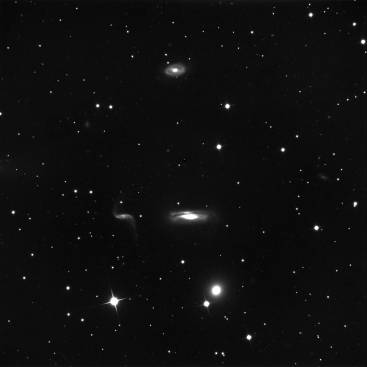 cluster of galaxies photograped with telescope