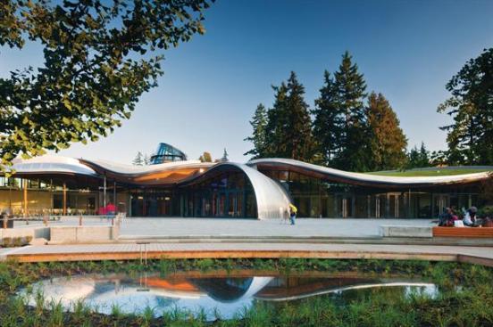 The curvilinear forms of the roof of the VanDusen Botanical Garden Visitor Centre are sheathed in aluminum where not covered by an extensive green roof.
