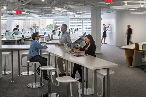 The far end of the Link Desk extends out into the space, and has become a hub for collaboration and impromptu meetings.