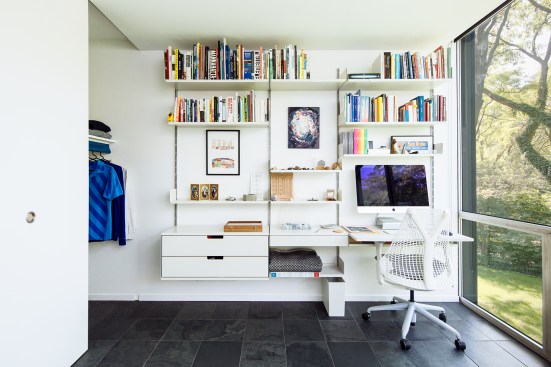 In an office, the firm opted to borrow the architect’s “clever soffit detail at the façade [to create] a similar nook in the closet.”