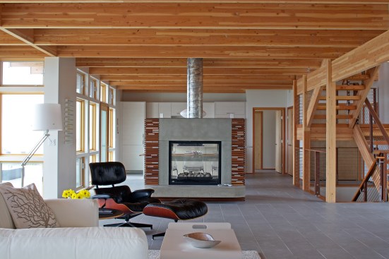 Horizontal view of the overall space from the screen porch to the kitchen
