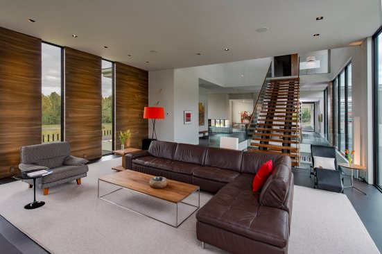 Walker Road modern home with floor to ceiling ribbon windows and floating stairs