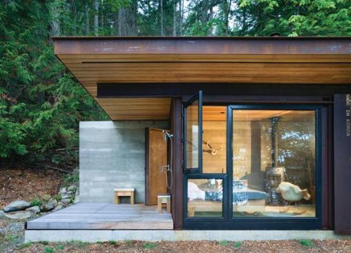 The sliding door opens the window wall to views and ventilation. 