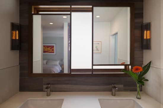 Master bedroom mirrors for a couple with a major height difference.