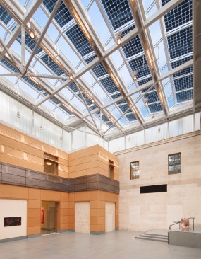 New light court with building-integrated photovoltaics in skylight