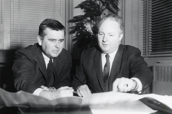 Logue (left) meets with Boston Mayor John Collins in the 1960s