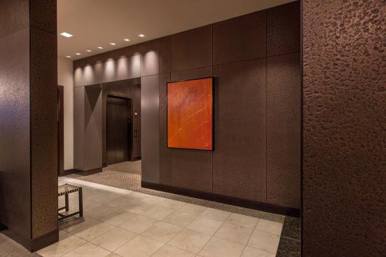 Walls shown in Bonded Bronze with Dark Patina and custom pattern at Residences at the InterContinental, Boston, Massachusetts