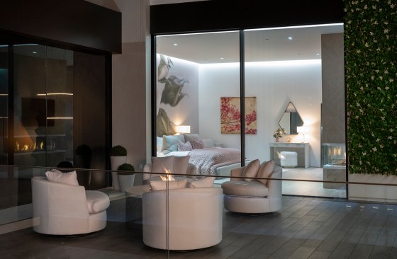 Serenity Indian Wells luxury modern mansion bedroom interior design with oversize rose wall graphic