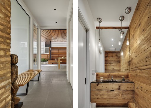 Halway leading to the outdoors/half bath located on main floor