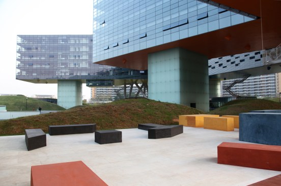 An outdoor courtyard beneath one of the building's branches.