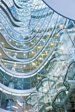 Air enters the building through doors in the lobby, the caf?, and louvers in the ground-floor curtainwall, and flows up through and is vented up and out the top of the central atrium to naturally ventilate the public spaces.