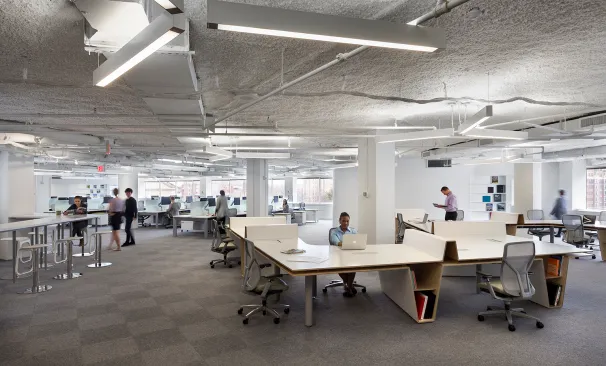 The Link Desk (to the left) and the Radar Desk (to the right) give way to an open office area beyond.