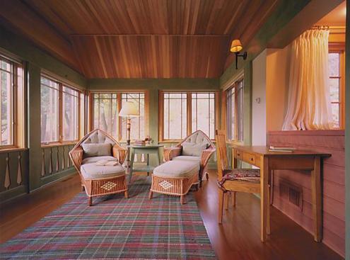 New windows and colorful exterior trim help unify the main house and garage on this former nursery. Throughoutthe interiors, fine maple and pine millwork and painstakingattention to detail evoke the project's Scandinavian heritage.