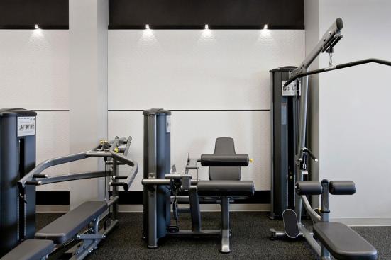 LEVELe Wall System with Capture panels; insets in Bonded Quartz, White with Waterfall pattern at Gracie Mews Pool & Health Club, New York, New York