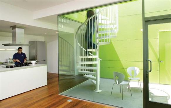 Scooped out balconies and terraces supply private outdoor rooms. 