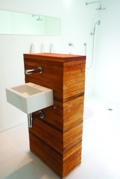 Reclaimed wood laths form a stand-alone plumbing fixture in the Mabel Street Residence, Hazelbaker and Rush’s renovated Tuscon, Ariz., home and studio.