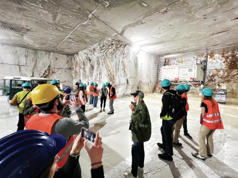 Inside a mine, complete with marble-cutting machinery.