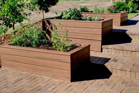 Trend #5: Simple planter boxes made from scrap lumber cost next to nothing but score points with buyers. These weather-resistant containers just outside of 
Builder’s Concept Home 2011 are made from leftover composite decking material.