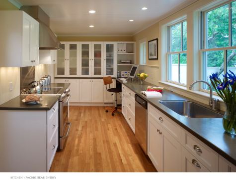 Trend #14: Designed by Lilly Dadagian Architects, this small yet serene New England kitchen is as practical as it is pretty. It comfortably tucks a computer workstation with office shelving into its layout.