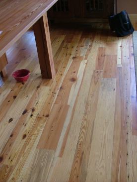 Chandler used reclaimed heart pine flooring throughout the house.