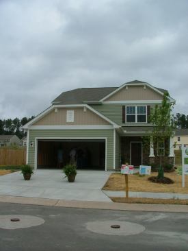 Cimarron’s 1,237-square-foot model home includes Energy Star-rated appliances, Green Label-certified carpet, low-E windows, WaterSense-approved fixtures, and low-VOC paint.