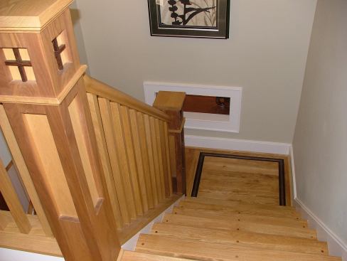 Eco Building Group’s Hank Wall’s woodworking background is apparent throughout this high-end home, including the inlays, details, and trim on the staircase, made with locally sourced Tennessee white oak.
