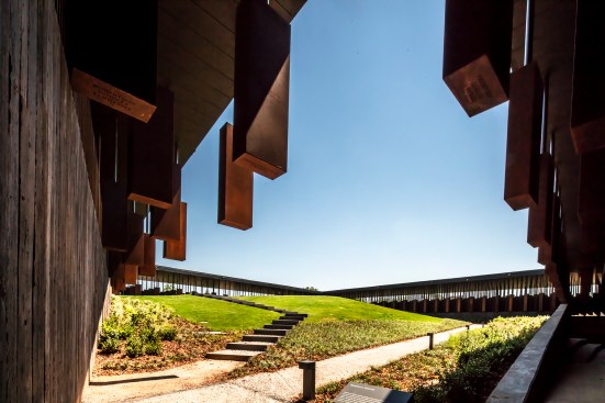 The landscaped space at the center of the square that overlooks the memorial