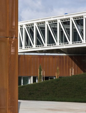 View of Cor-Ten façade panels on first floor from plaza