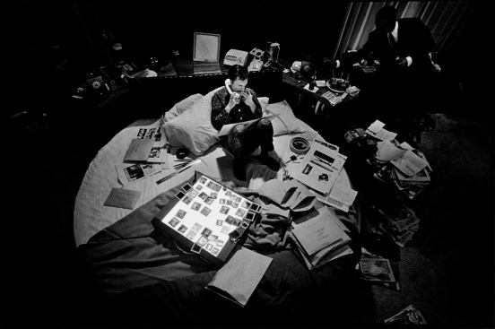 Hugh Hefner in his circular bed, 1966.