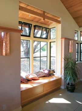 Some thoughtful details, such as a glass floor in the tower and operable transoms, bring light and air deep into the house.