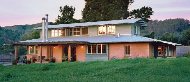 This 1,860-square-foot house near Mill Valley is a showcase for eco-friendly design: passive solar orientation, radiant heat, cellulose insulation, and straw bale construction, covered with sprayed earth.