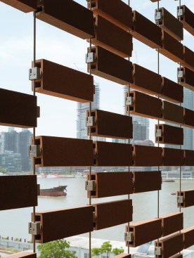 Brick screen detail, showing ceramic bricks suspended on stainless steel wires
