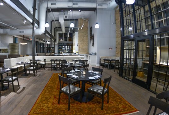Designers conceptualized the restaurant’s open kitchen as a “theater” of sorts.
