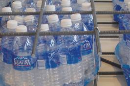 A mock-up of the SFIS with bundled plastic bottles. Most plastic water bottles are discarded with the caps on; capped, empty bottles are airtight and can be placed within a concrete structure to create a void. Hydrostatic pressure from wet concrete will only nominally reduce the air volume inside the bottles.