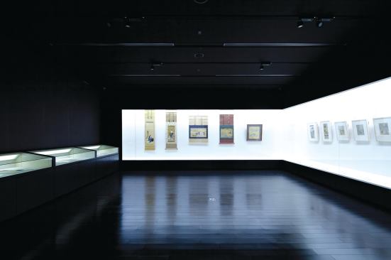 Pieces from the university's collection of Ukiyo-e prints are rotated from off-site storage and into carefully crafted display cases in one the musem's galleries. With black-stained wood floors, and black-painted walls and ceiling, the focus in the room is placed squarely on these "pictures of the floating world."
