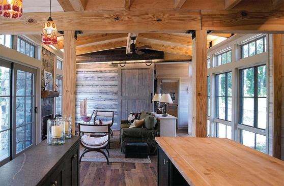 In lieu of gypsum, the architects salvaged a log cabin from West Virginia and used the pieces throughout the home.

