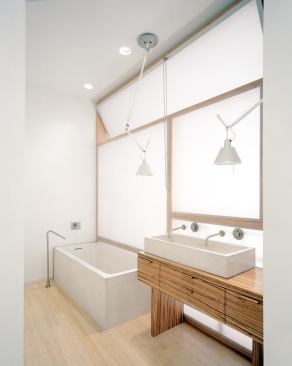 The Barry Loft master bath illustrates the firm’s knack for elevating commonplace materials.