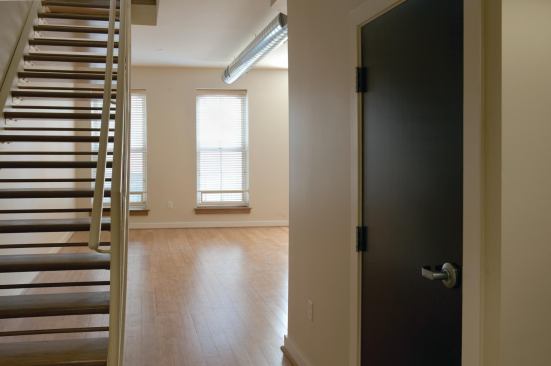 DRYWALL & ADHESIVE The National Gypsum drywall was manufactured with 100% recycled content from power plant waste. The drywall was applied with OSI Green Series low-VOC construction adhesive, which is Greenguard-certified. National Gypsum: 704.365.7300. 
http://www.ngc-green/. OSI: 800.624.7767. 
http://www.osipro.com/. 
DOORS The apartments’ Mohawk flush doors feature a mahogany-finish wood skin over an agrifiber core. The 100% recycled agrifiber consists of fibrous material such as wheat straw, sunflower husks, or hemp. The agrifiber cores contain no added urea-formaldehyde. 570.473.3557. 
http://www.mohawkdoors.com/.