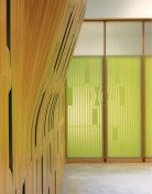 The process of manufacturing and assembling the east wall (at left) is highlighted by the adjacent wall panels (at right), which display the tooling paths for each MDF piece used in the east wall's fabrication.