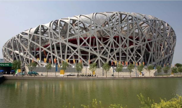 BEIJING NATIONAL STADIUM, Beijing, China


Lee Bey, Executive director, Chicago Central Area Committee, and former architecture critic, the Chicago Sun-Times

"My favorite building of the year is the Beijing National Stadium, affectionately known as the "Bird's Nest," a host site of the 2008 Summer Olympics. With its seemingly random crisscrossing structural members, the exterior of the stadium, created by architects Jacques Herzog and Pierre de Meuron with China Architecture Design and Research Group and artistic consultant Ai Weiwei, is chaotic, yet orderly; a marriage of structure and façade. The 80,000-seat stadium is as dramatic as the events it hosted."


Joan Ockman, Former director, Temple Hoyne Buell Center for the Study of American Architecture, Columbia University

"A disclaimer: I haven't seen the Bird's Nest yet in three-dimensional reality. But for creating a dazzling contemporary symbol and media image that brilliantly captured the popular imagination during last summer's Olympic games, bravo to the architects and their Chinese collaborators. They turned straw into steel, the stuff architectural dreams are made of."