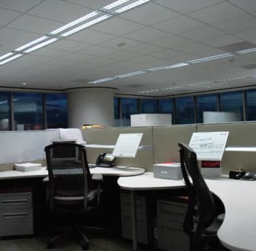 Sophisticated interiors in the cafeteria, winter garden, and elevator corridors provide a decorative counterpoint to the open office areas where a comprehensive daylight harvesting control system keeps the space illuminated by night and day.