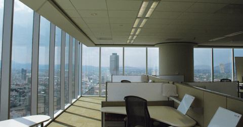 Sophisticated interiors in the cafeteria, winter garden, and elevator corridors provide a decorative counterpoint to the open office areas where a comprehensive daylight harvesting control system keeps the space illuminated by night and day.